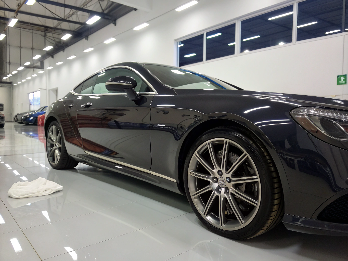 Meticulously detailed and polished car with mirror finish reflection